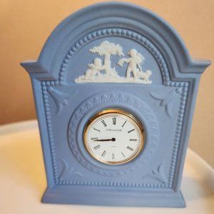 WEDGEWOOD JASPERWARE CLOCK. ORNAMENTAL CHERUB DETAIL